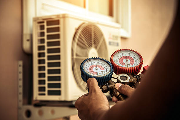 Professional Air Conditioning Service technician working in Talmage, PA